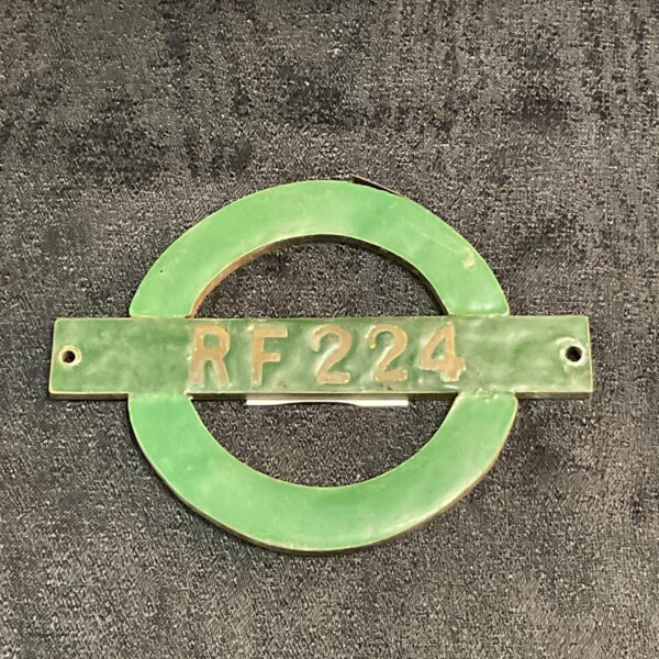 Vintage London Transport RF enamel badge for bus identification.