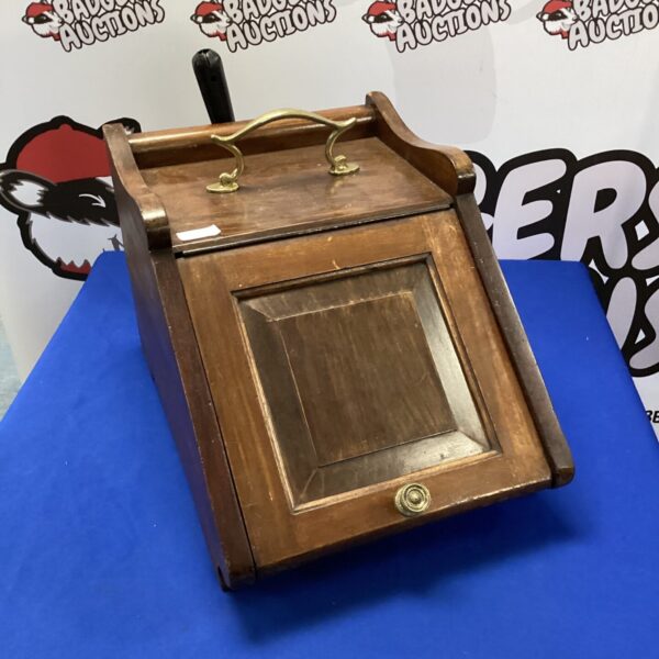 Vintage wooden coal scuttle with handle, antique fireside accessory.