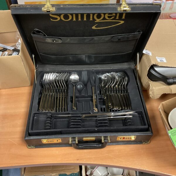 Vintage Solingen cutlery set in a fitted case, showcasing quality craftsmanship.