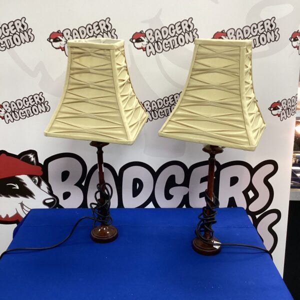Pair of vintage Bakelite style table lamps with cream shades.