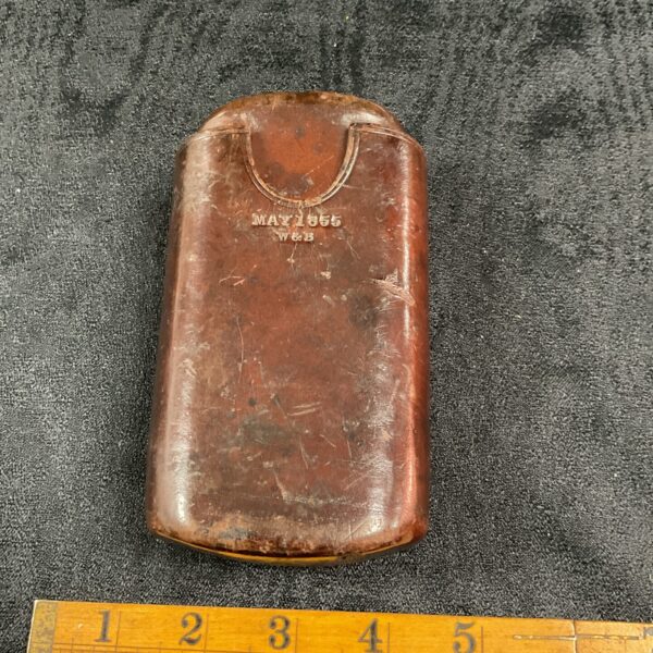 Antique leather cigar case embossed May 1855, a vintage smoking accessory.
