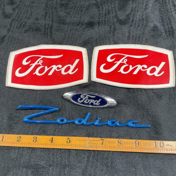 Vintage Ford Zodiac badges and stickers for collectors.