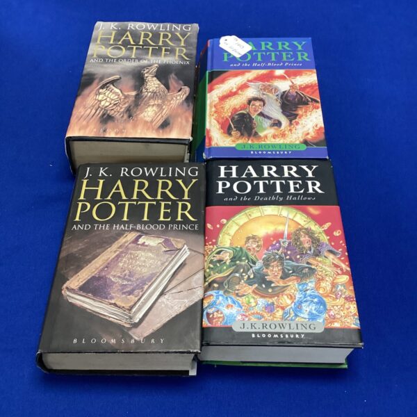 First edition Harry Potter books by J.K. Rowling, a collectible set.