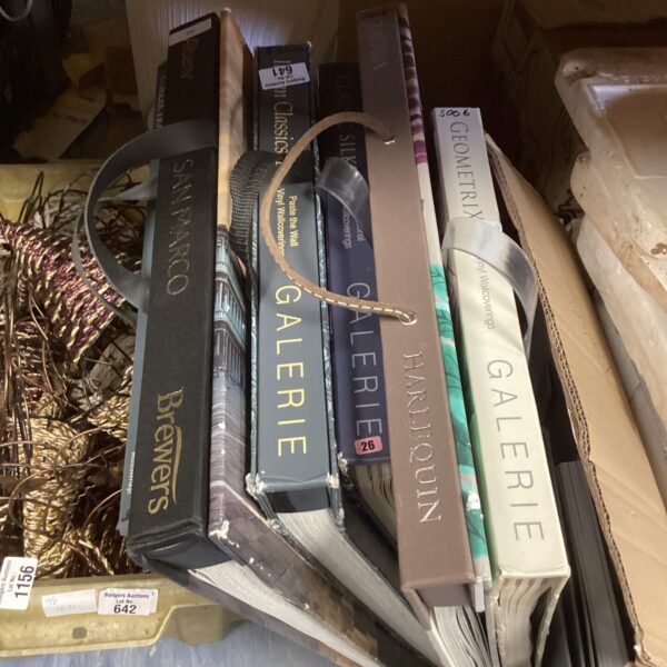 Vintage wallpaper books from Brewers, showcasing interior design patterns.