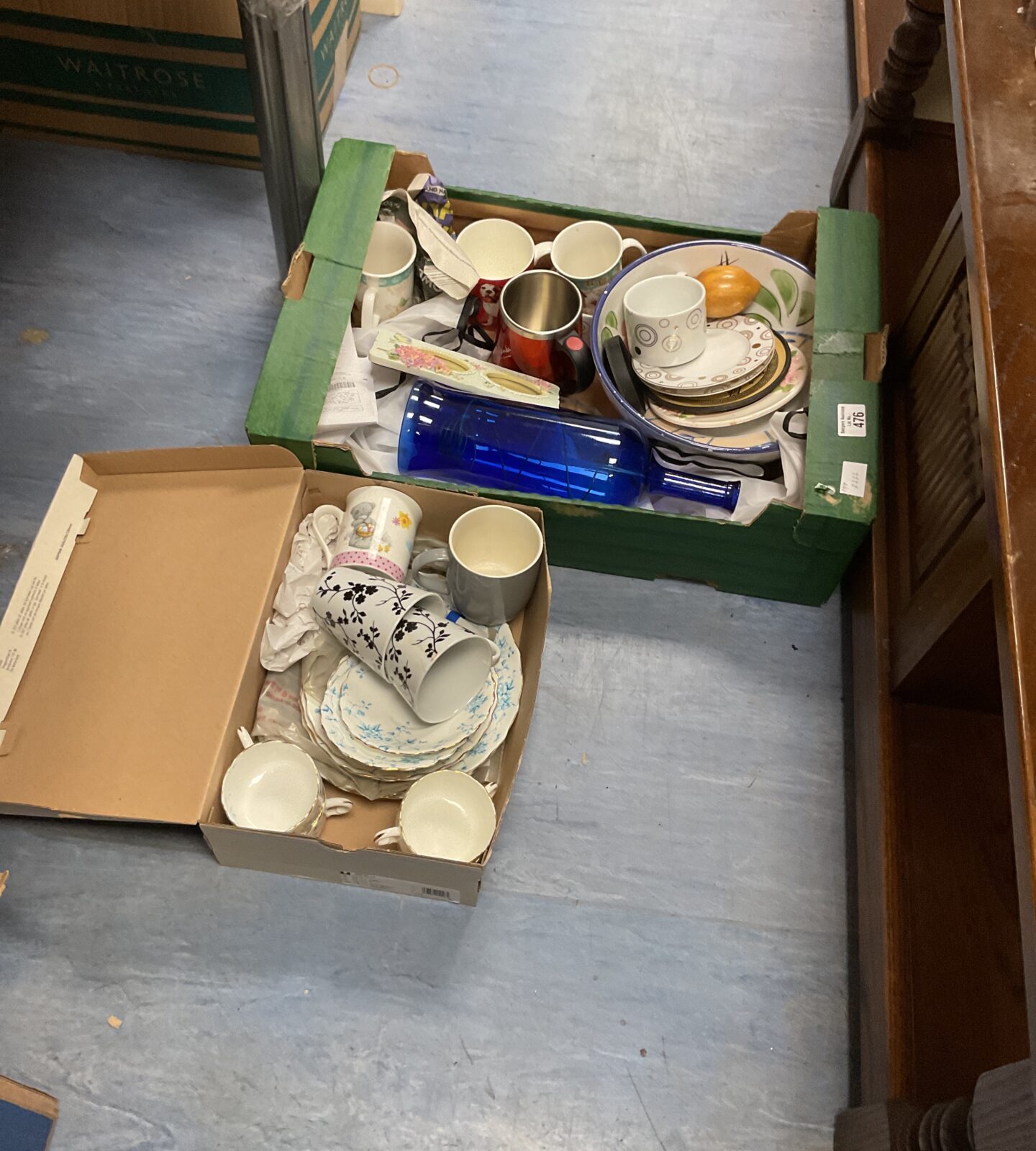 Two boxes of mixed china, plates cups and others