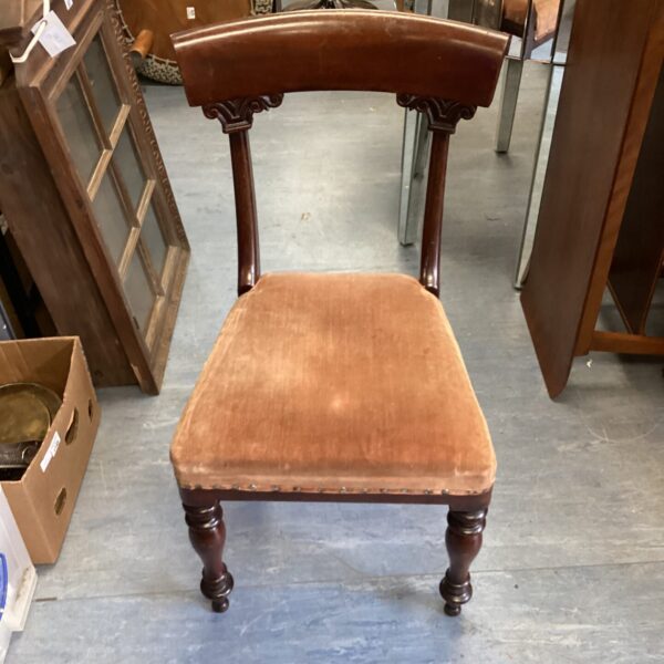 Vintage country style dining chair with upholstered seat.