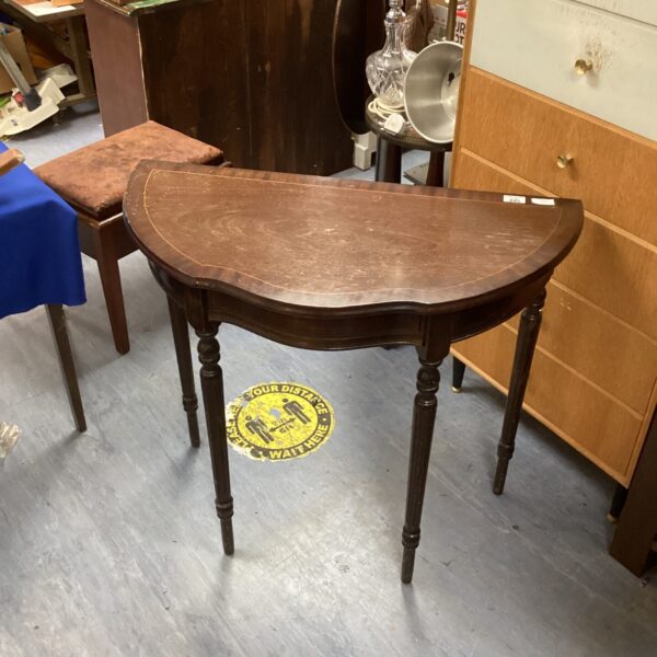 Antique mahogany console table with inlaid detailing, vintage hall furniture.