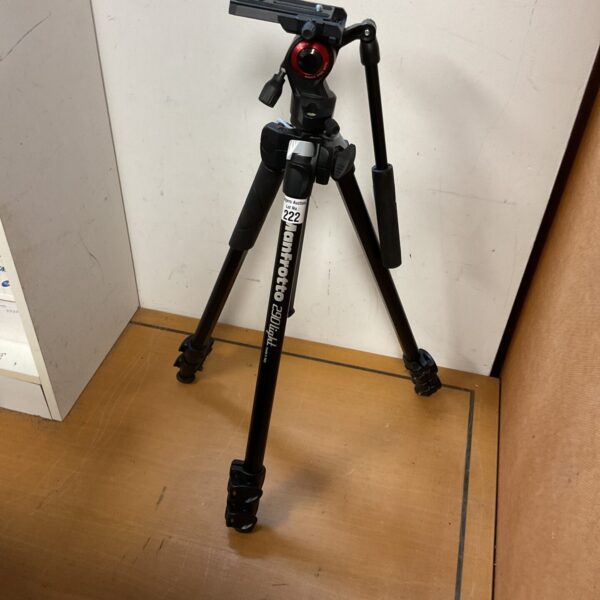 Black Manfrotto 290 light tripod for camera photography.