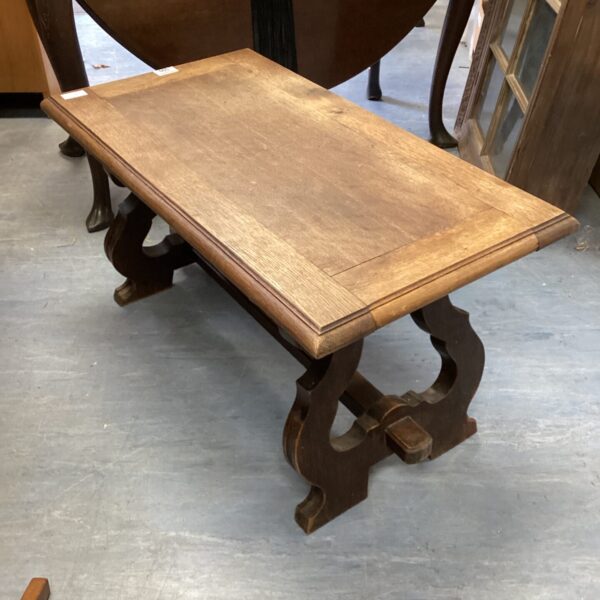 Vintage small oak coffee table with turned legs.