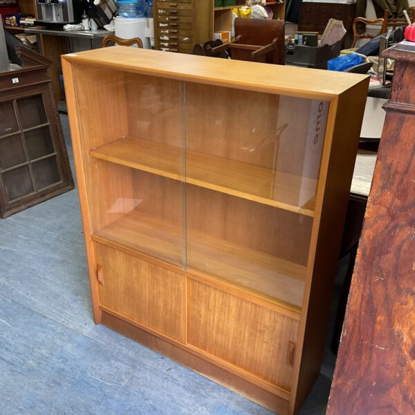 Front view of vintage mid century Gibbs display cabinet.