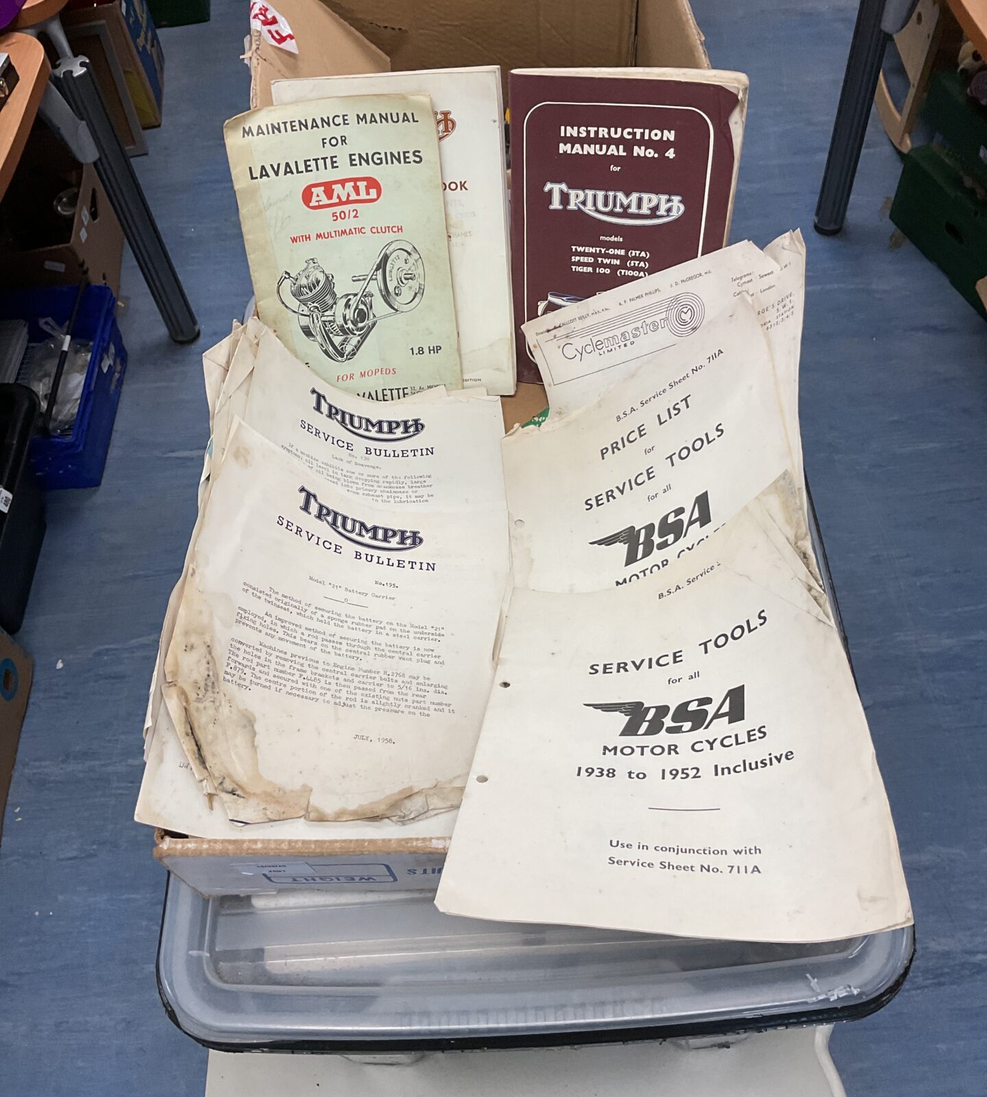 Box of classic triumph & bsa motorbike manuals & ephemera