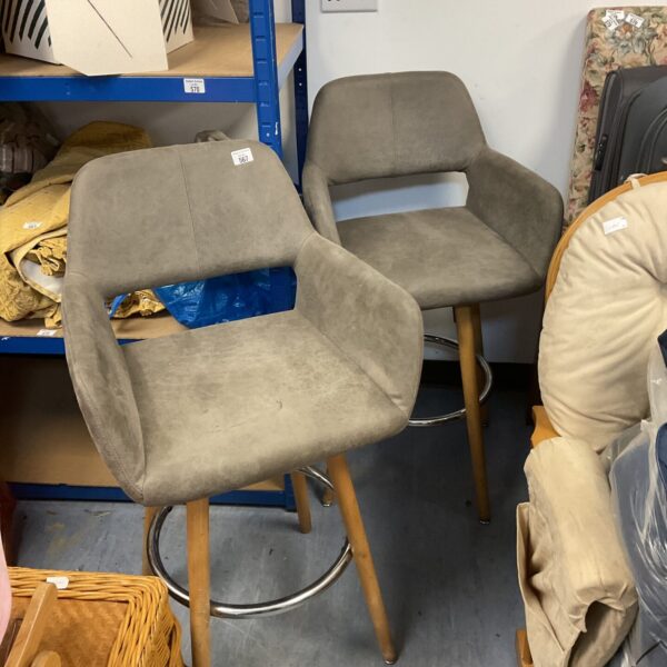 Pair of grey fabric swivel bar stools