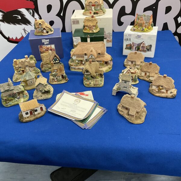 Large collection of Lilliput Lane porcelain cottages for collectors.