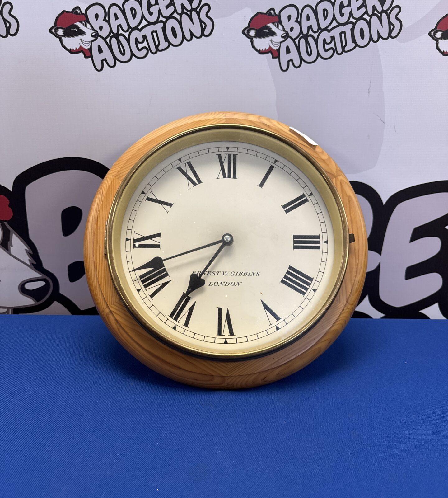 Ernest W Gibbins pine framed wall clock 12.5” diameter approx