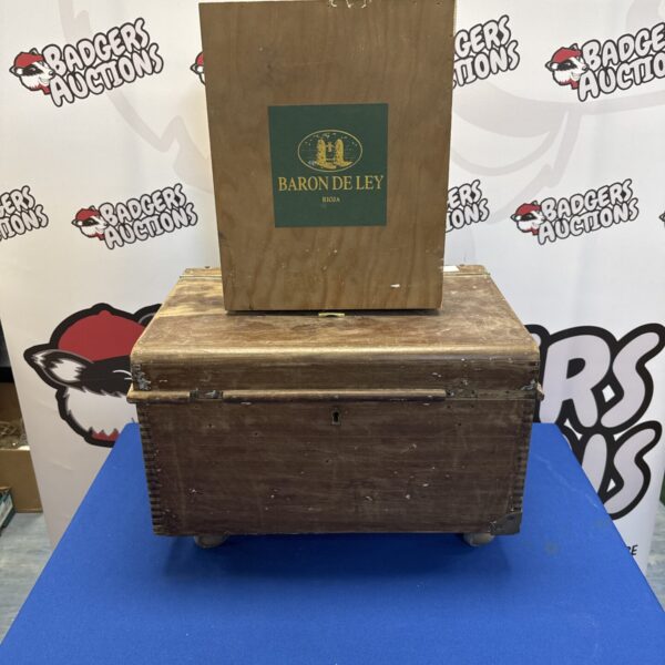 Vintage wooden chest on castor wheels (key present inside) with baron de ley wine case
