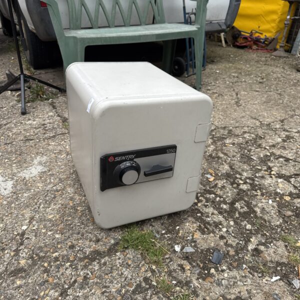 Vintage Sentry 1250 combination safe for home security.