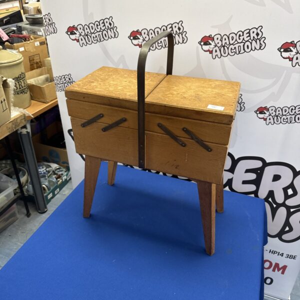 Vintage wooden sewing box with handle, antique sewing storage.