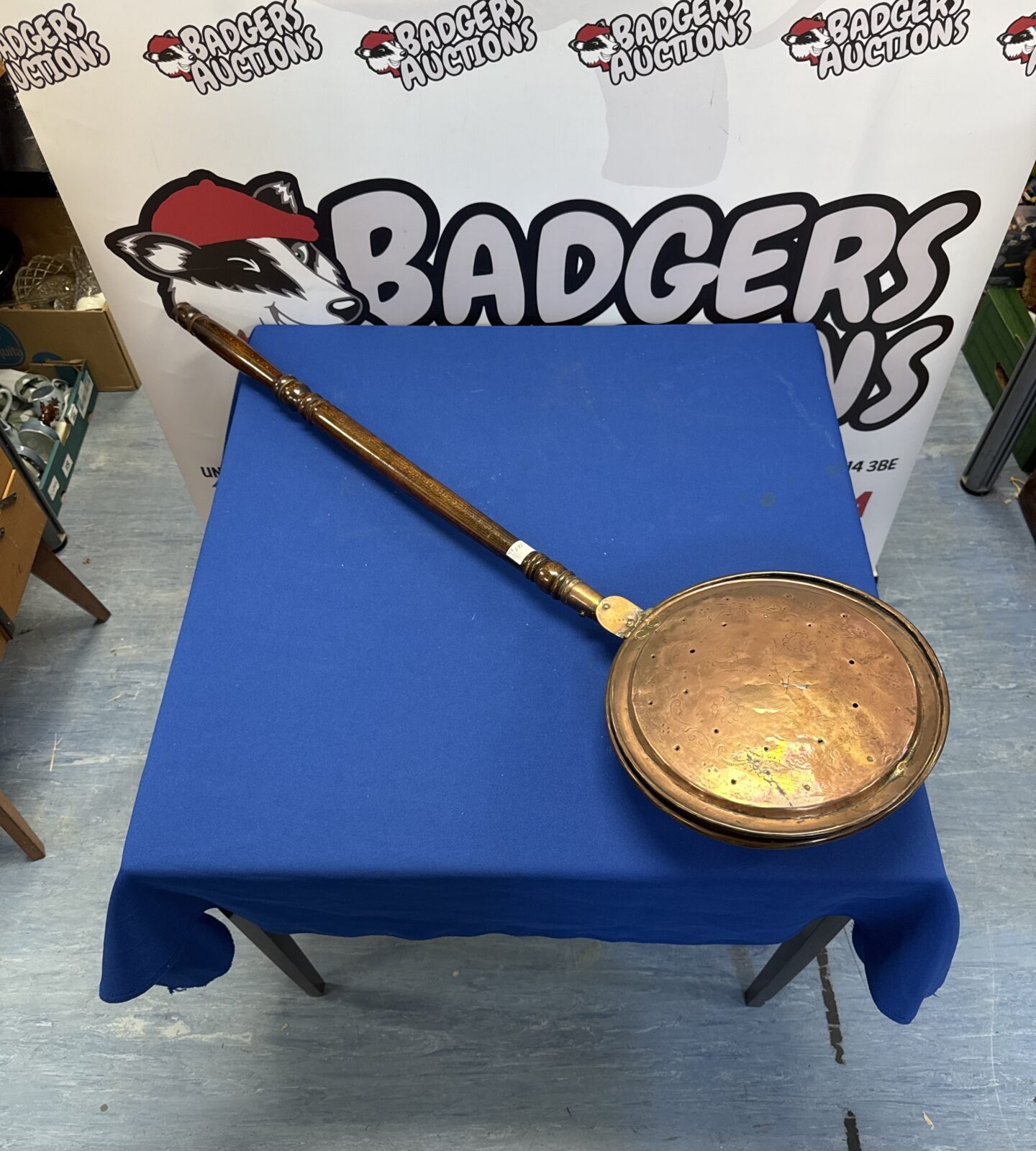 Antique copper bed warming pan with flower patern