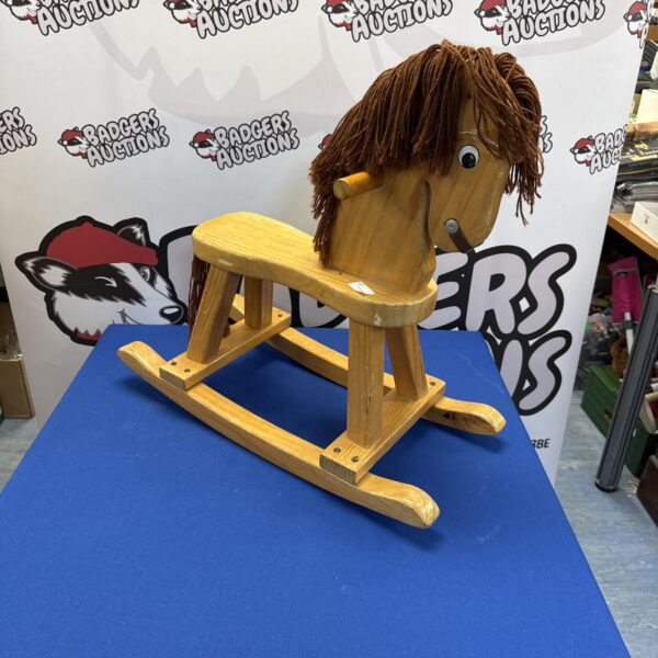 Vintage child’s wooden rocking horse