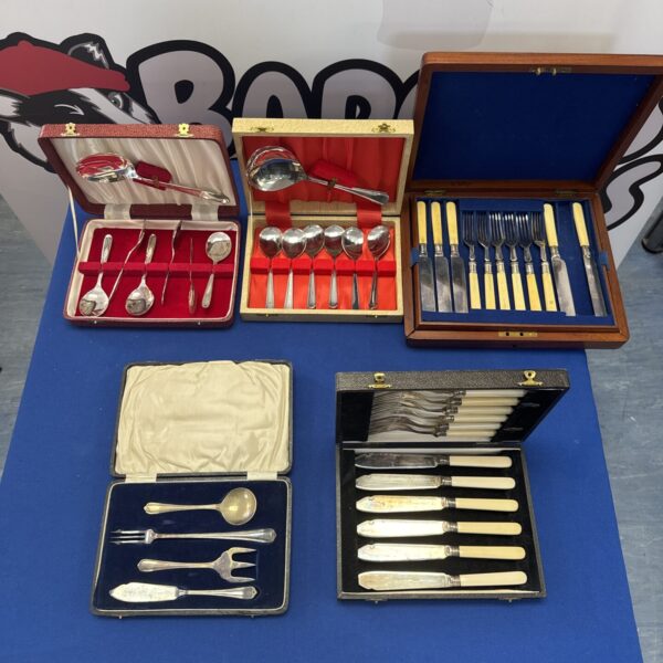 Five assorted cutlery sets