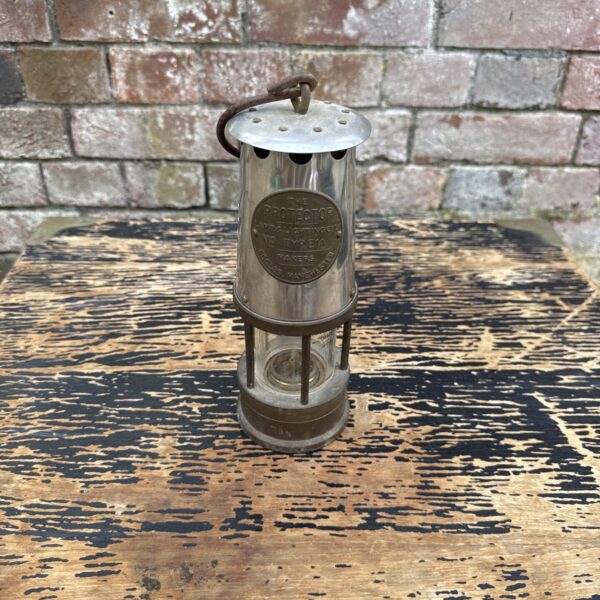 Vintage Protector Type 1A miners lantern, a classic mining safety lamp.
