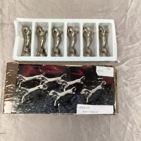 Vintage French Art Deco knife rests with horse motif.