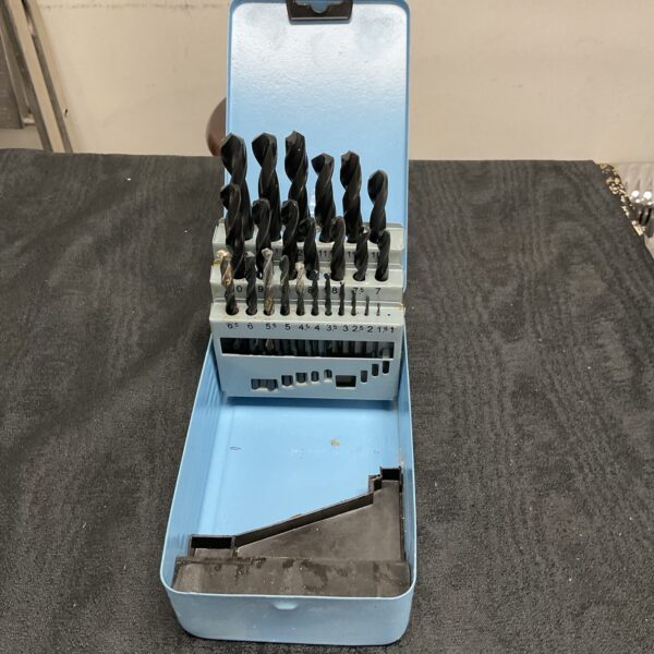 Closed blue metal tin containing a vintage Willow twist drill bit set.