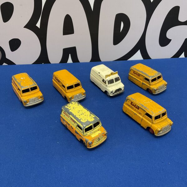 Vintage lot of six diecast Bedford vans, including Corgi and Dinky models.