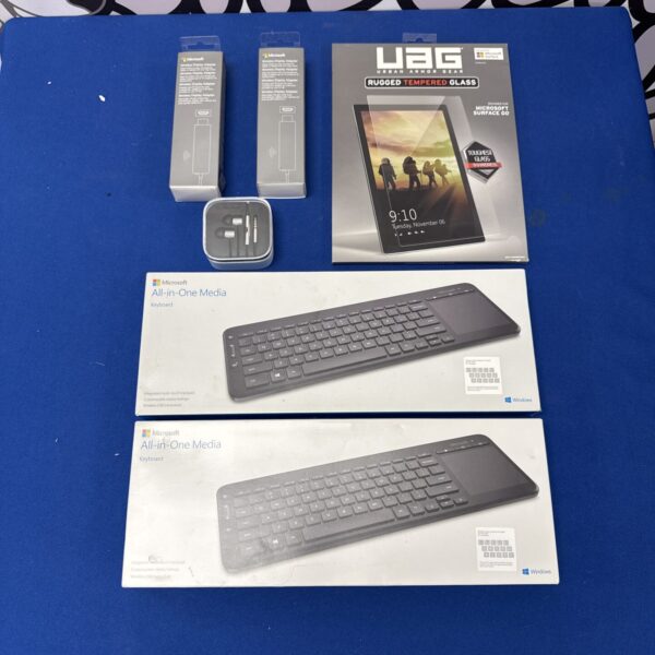Bundle of items inc two Microsoft keyboards, wireless display adapters, earbuds & tablet protective cover