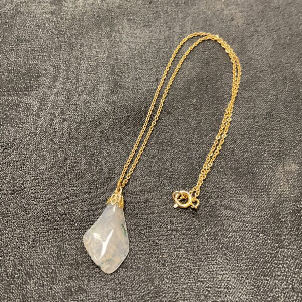 Semi precious quartz pendant necklace with plant inclusions