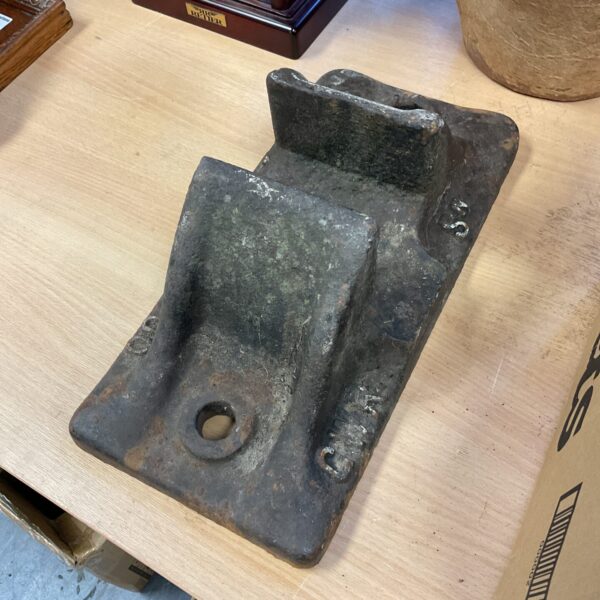 Antique Great Western Railway rail mount for trackside equipment.