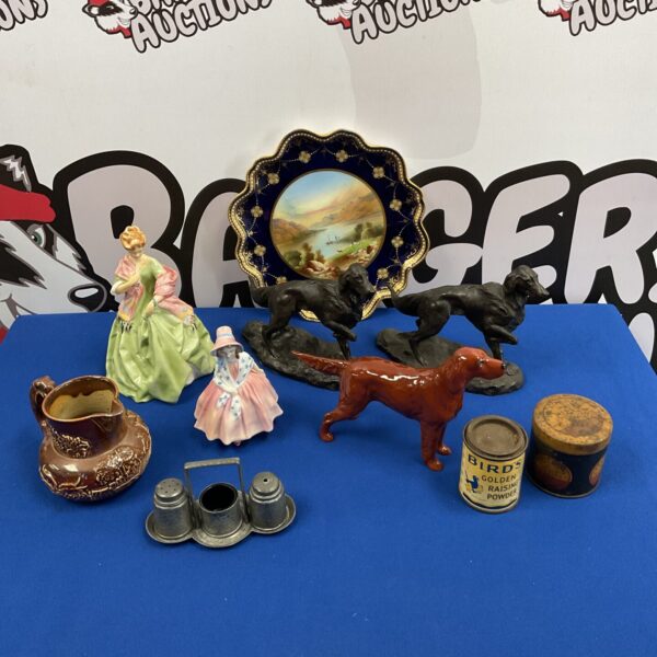 Vintage lot of collectible dog figurines and tins.