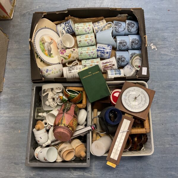 Mixed lot of vintage ceramics and collectibles, including mugs and tins.