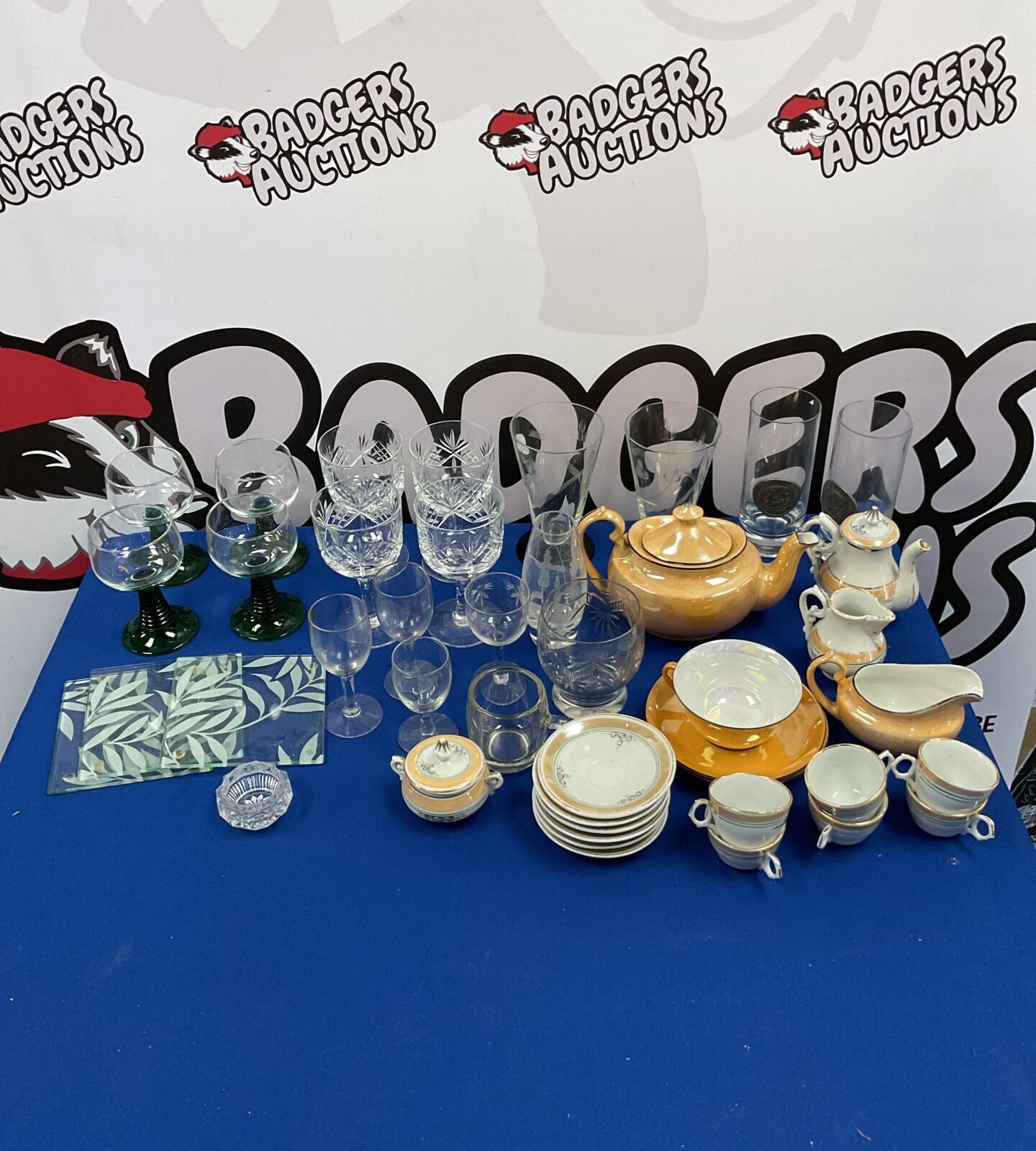 Box of mixed glassware including miniature porcelain teaset