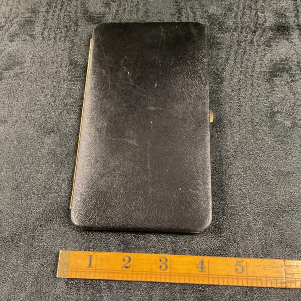 Vintage Dunhill cigarette case, black and gold, collectible accessory.