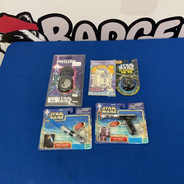 5 Star-Wars memorabilia items incl. Phillips Darth Vader earphones, yoyo, lightsaber and pistol