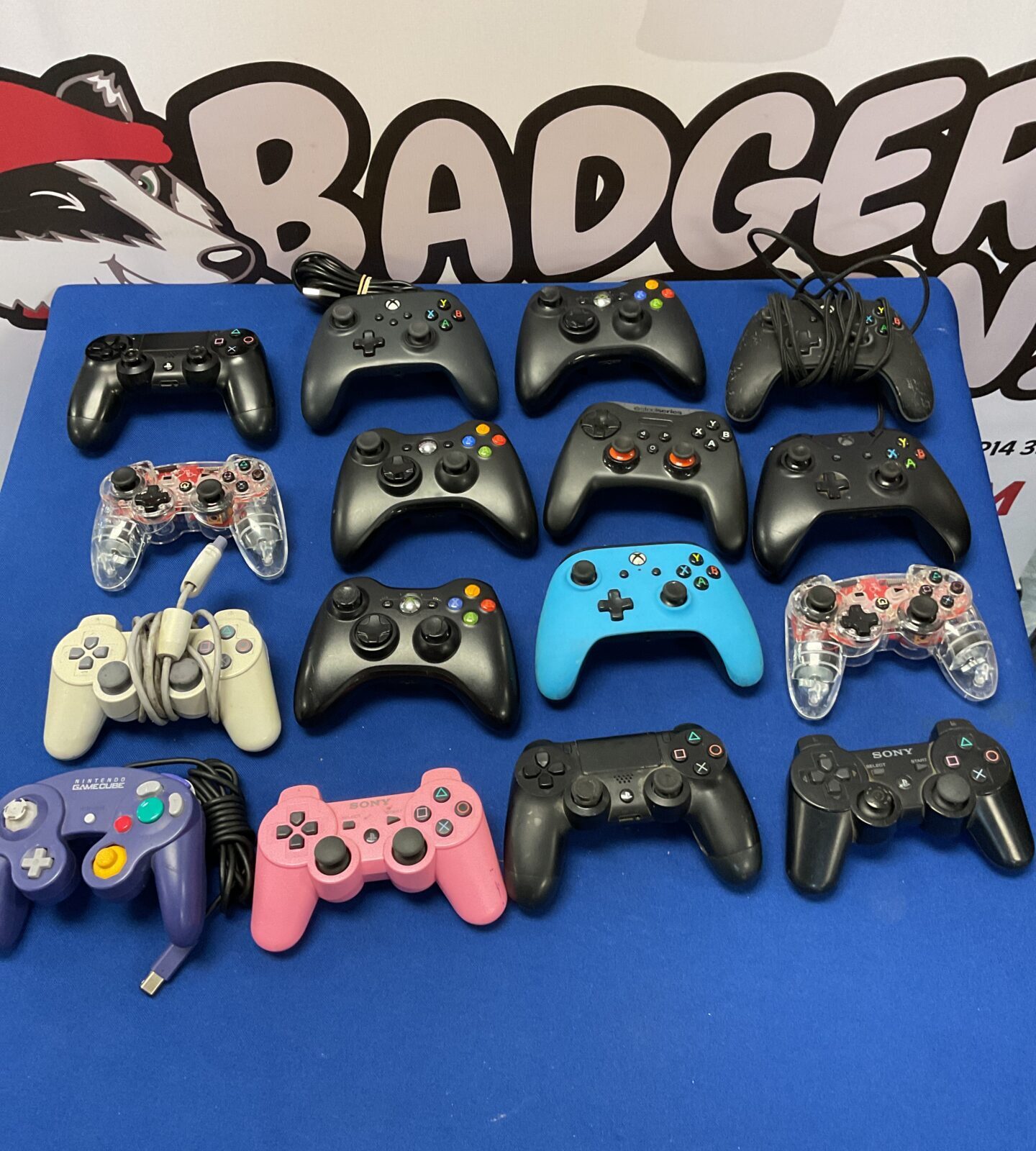 Large lot of gaming controllers including PlayStation & xbox