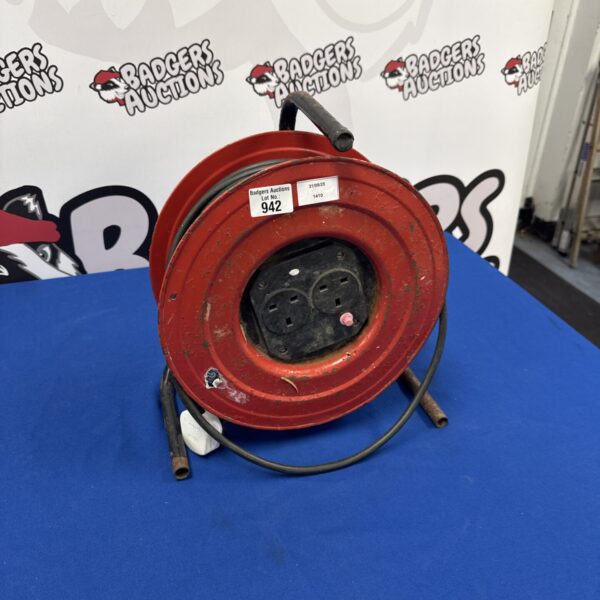 Vintage two-gang extension reel for workshop power supply.