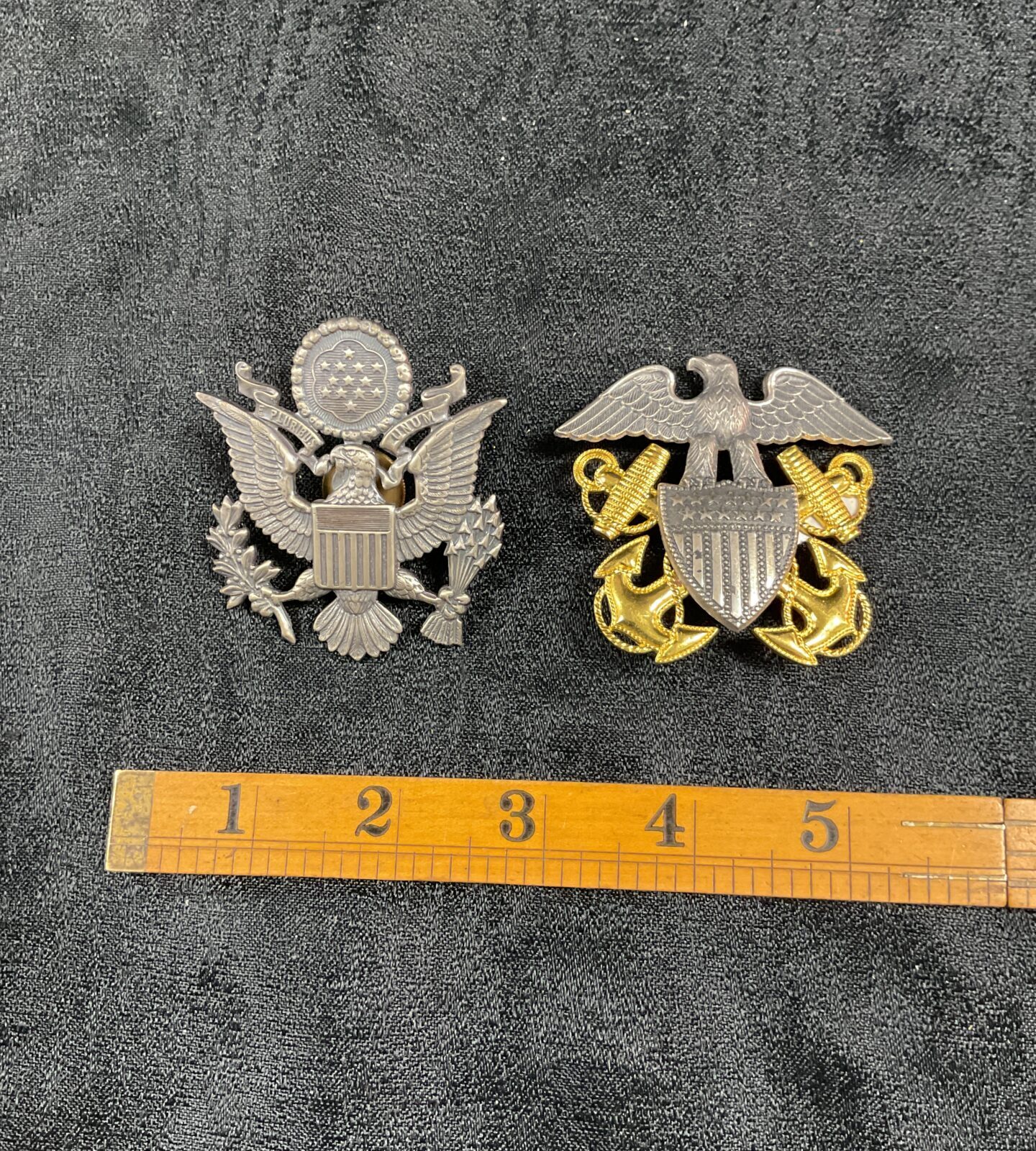United States airforce and United States Navy cap badges