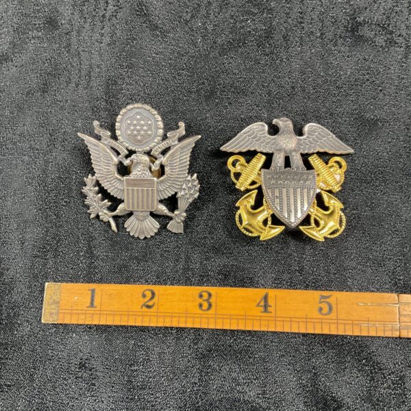 United States airforce and United States Navy cap badges