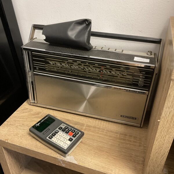 Vintage Grundig Melody Boy radio with Decimo calculator, a classic German set.