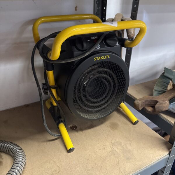 Front view of a vintage Stanley 2kW space heater.