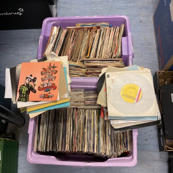 Lot of vintage 7 inch vinyl records, rock singles collection.