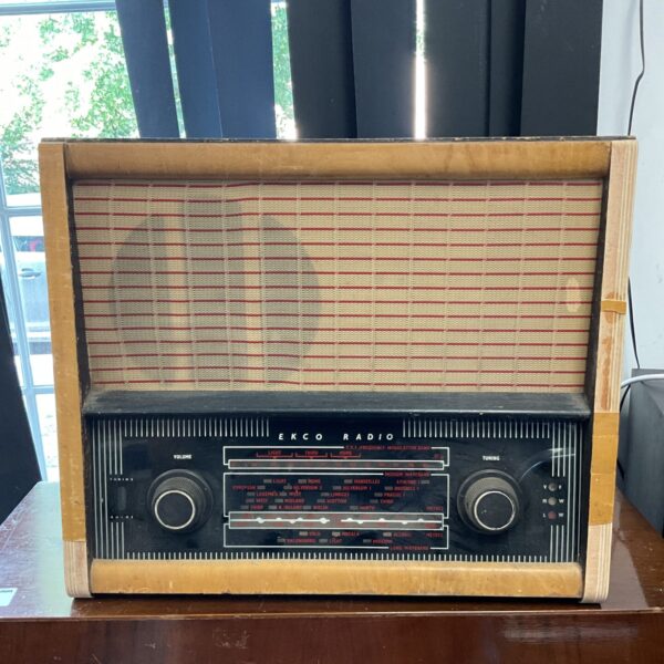 Vintage Ekco valve radio in used condition, classic mid-century design.