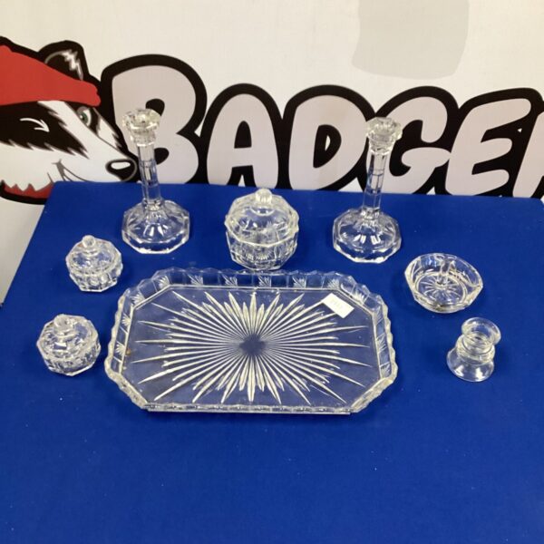 Vintage cut glass dressing table set with tray, powder box, and holder.