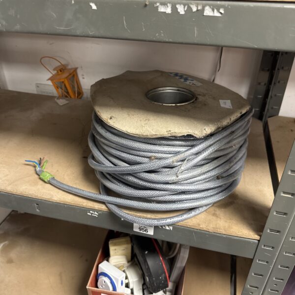 Close-up of a large reel of armoured cable.