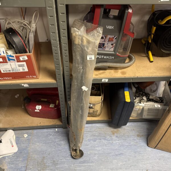 A set of drain rods for clearing blocked drains.