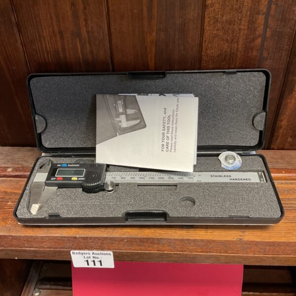 Stainless steel digital calipers for precise measurement.