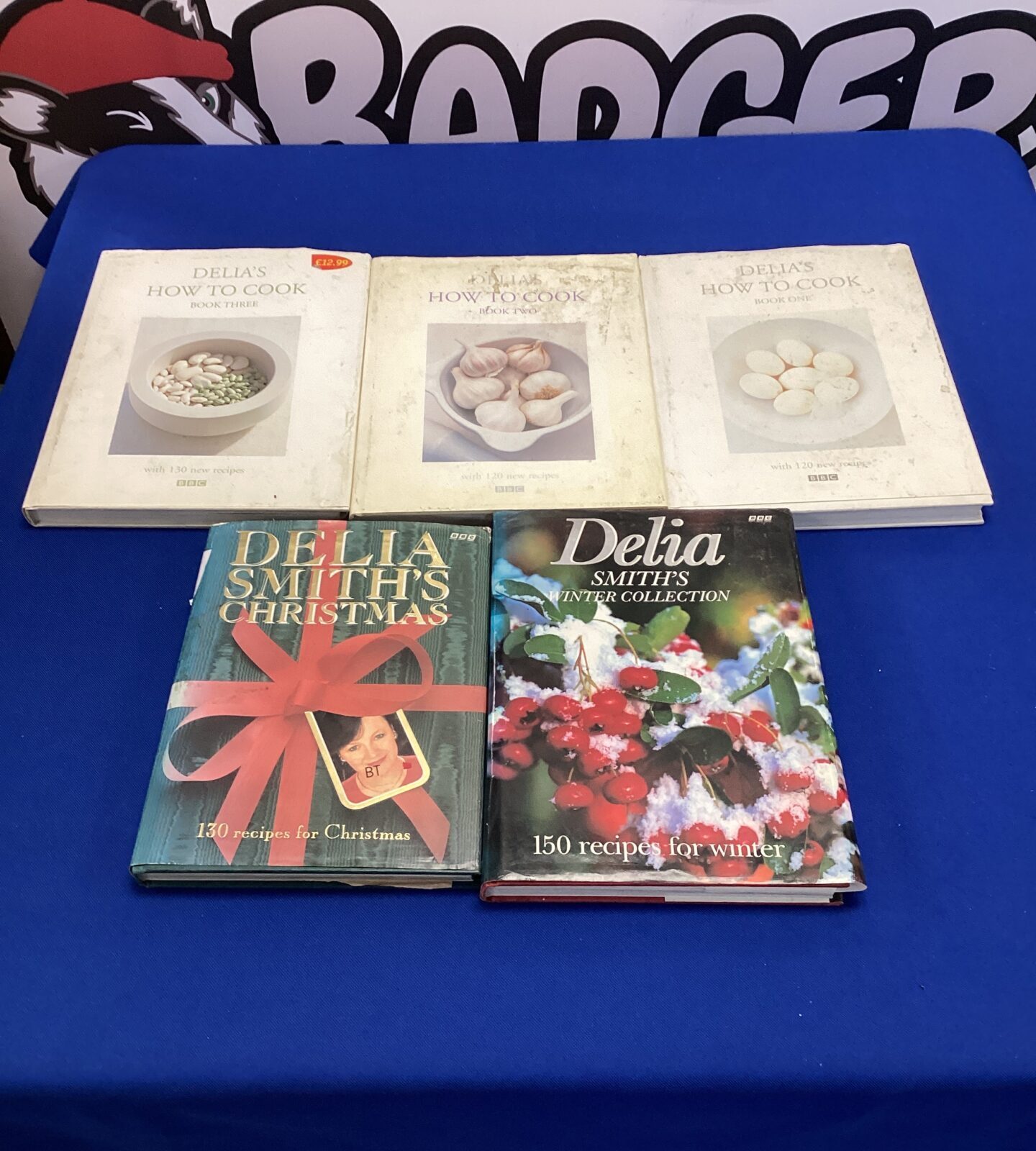 Five Delia’s cook books inc hot to cook volumes one to three & delia smith’s winter collection