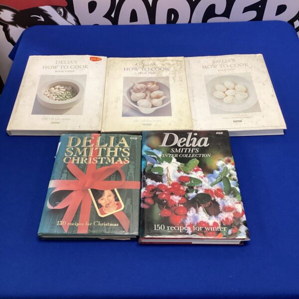 Five Delia’s cook books inc hot to cook volumes one to three & delia smith’s winter collection